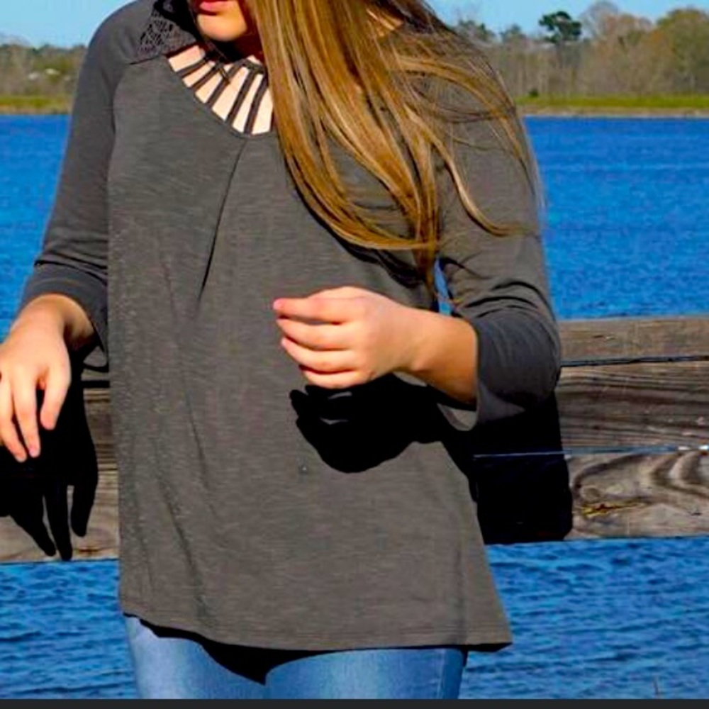 Olive flowy top with an open back